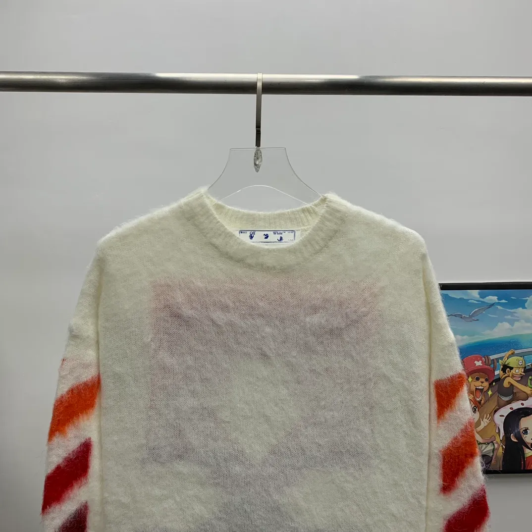 New top tested version OFFWHITE (OW) gradient mohair striped arrow sweater hoodie gradient rendering arrow couple sweater Mohair (English Mohair; Turkish: MUKHYAR) refers to the coat of Angora goats, also known as Angora goat hair. The name comes from Turkish, meaning "the best hair". It has good elasticity, pressure resistance and special luster. It is an excellent raw material for making plush fabrics and one of the most advanced animal textile fiber raw materials in the world market. Mohair has a shape similar to long wool. The fiber surface is smooth, strong luster, high strength, good elasticity, less curl, and easy to wash. Mohair can be used in jacquard blankets, long-haired coats and high-gloss wool fabrics. Mohair sweaters from ow are released every year🛒 The same style and ever-changing colors. There is really no girl who doesn’t love it. It is super suitable for wearing under a down jacket in winter without being bulky! If the lower body is missing, their favorite os version🙋🏻‍♀️ intuitively adds natural softness and fairy beauty effect, which is the best choice! The upper body is lightweight and does not weigh down the body while keeping warm. The sleeves and the gradient arrow parts on the back are repeatedly patterned until the gradient level is satisfied before large-scale products are released. The craftsmanship is extremely demanding. Each sweater is woolen at least ten times to give it a plush, thick feel and good fluffiness! ✅ Fabric composition: 50% mohair 32 spandex 18% wool, three-level anti-pilling Color: black and white gradient Sizes Mohair is lighter and softer, so be careful not to machine wash it, not machine washable! ! emphasize! !  ⚠️Hand wash with warm water and cold water P:440
